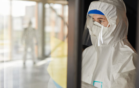 Female Worker doing Chemical Cleaning Indoors