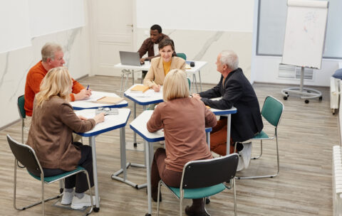 Group of students working in team at lesson