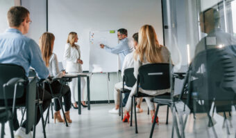 Teachers making master class. Group of professional business people is in the office