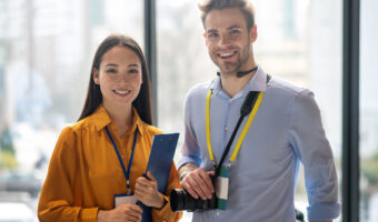 Two reporters feeling happy after a good working day