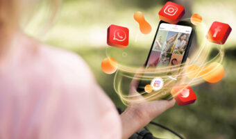 hand-holding-smartphone-social-media-concept