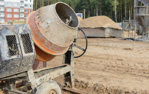 Industrial concrete mixer at a construction site. Preparation of concrete and mortar.