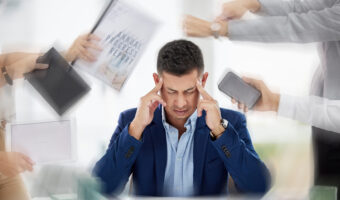 hands-with-paperwork-headache-stressed-businessman-working-with-problem-bad-mental-health-blurry-migraine-anxiety-frustrated-worker-overworked-tired-exhausted-with-documents-deadlines (1)