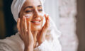 Woman applying face cream