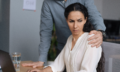 workplace-harassment-male-boss-touching-his-young-female-assistant-while-she-is-working-laptop AJUSTADA